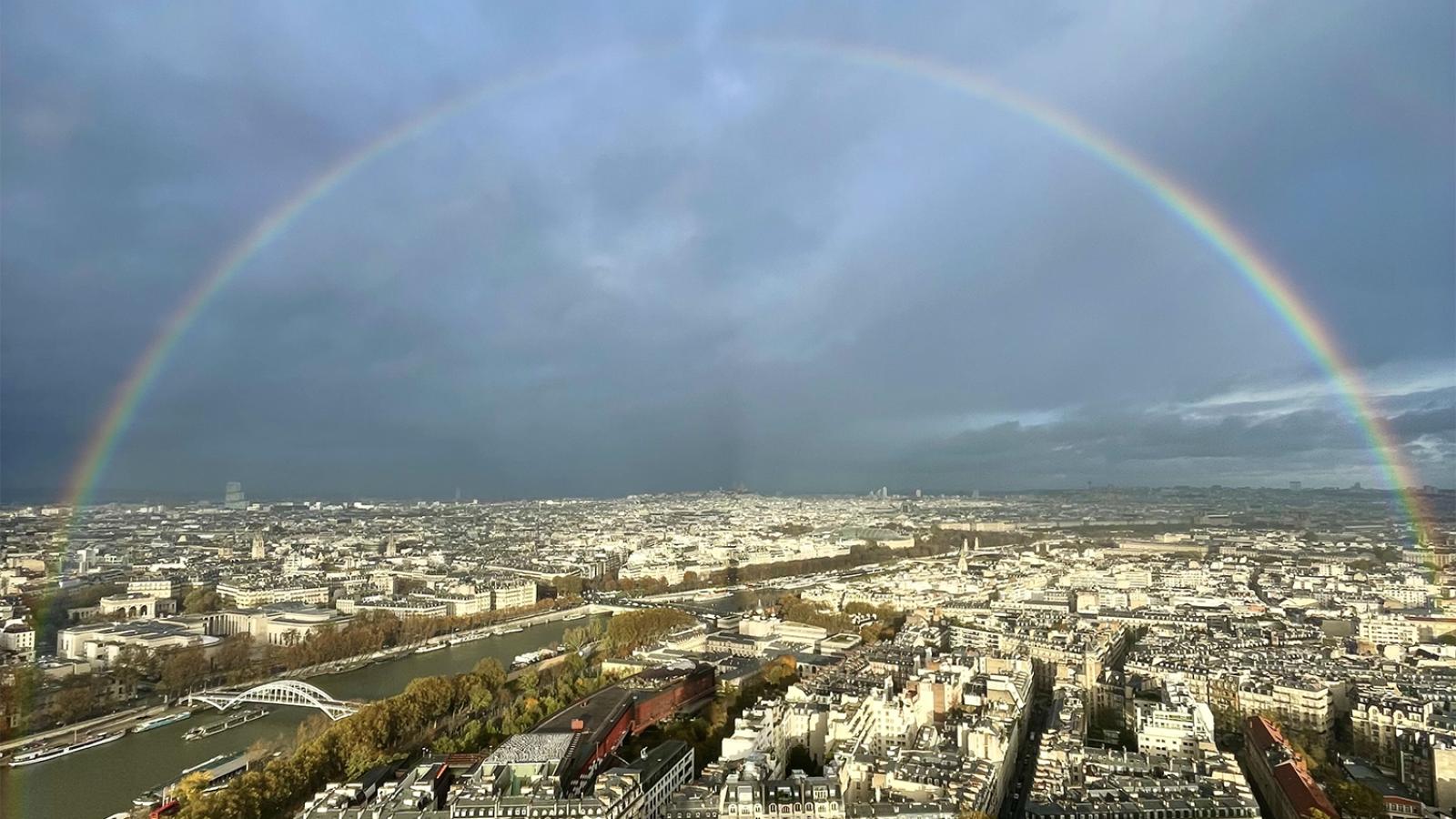 Full rainbow over city of Paris