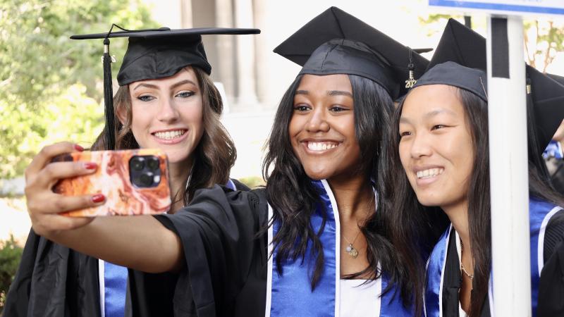 class of 2023 grads taking a selfie